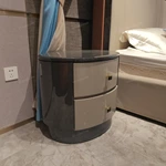 High-Gloss Round Nightstand with Grey Diagonal Pattern and Curved Cream Drawers